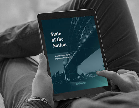 A tablet showing the State of the Nation Research by NetStripes